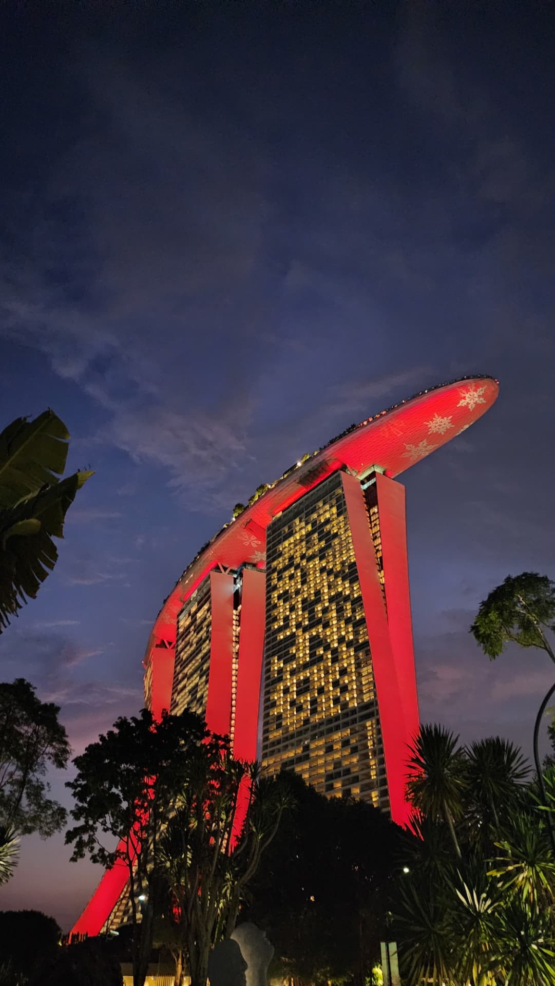 Marina Bay Sands illuminated in red at night in Singapore